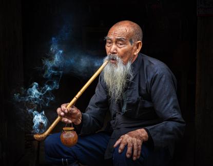 An old man smoking
