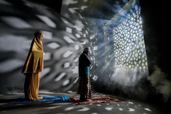 Man and wife praying