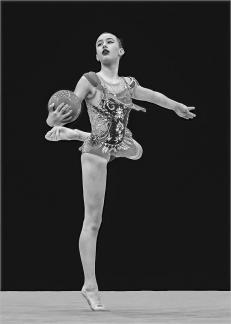 Young Gymnast with ball 23