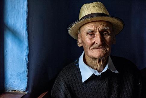 Portrait on blue wall