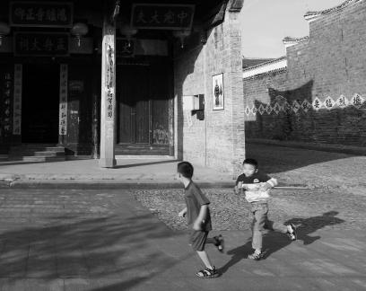 Playing in the courtyard 1
