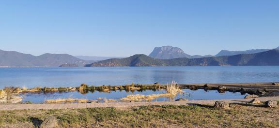 Mountains surround water 5