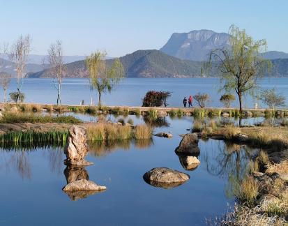 Mountains surround water 6