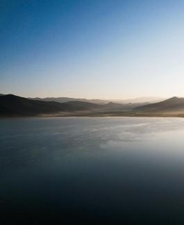 Mountains surround water 2