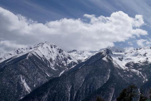 Snowy Peaks and Clear Clouds 12