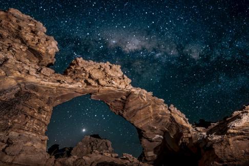 Venus Setting Under Rock Arch