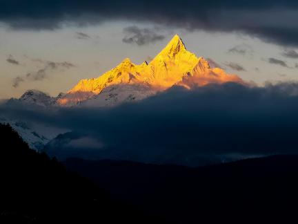 Golden Peak above the clouds 1