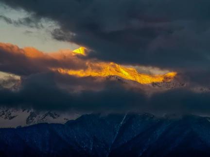 Golden Peak above the clouds 3