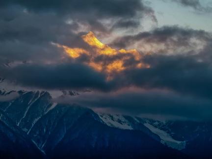 Golden Peak above the clouds 4