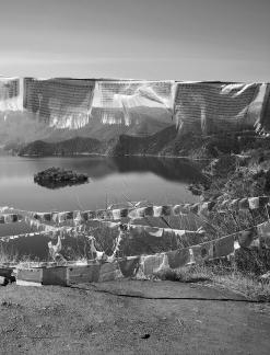Mountains surround water 25