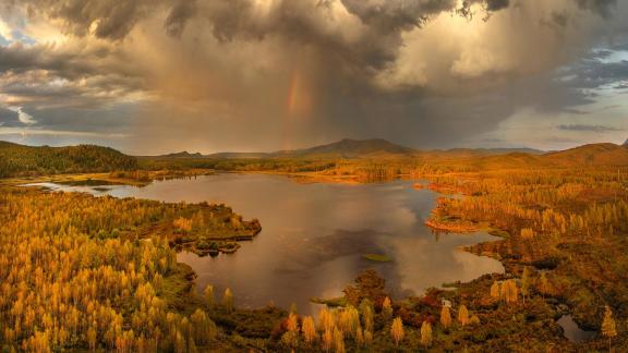 Beautiful Rainbow with Lake Light