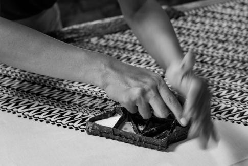 Working hands of a Batik artist