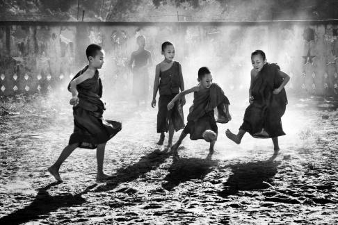 Monks playing football