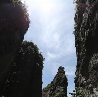 Green between cliffs 14