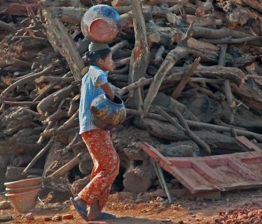 Burma carrying pots pottery village