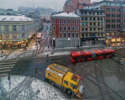 Oslo snowplough meets tram