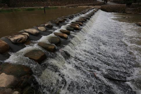 White waves chasing stones 2