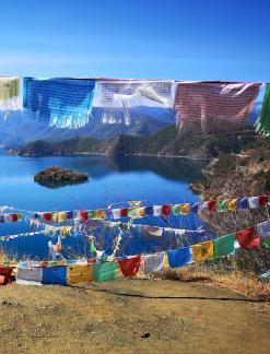 Mountains surround water 25