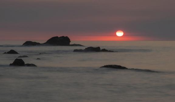 Sunset in calm waters