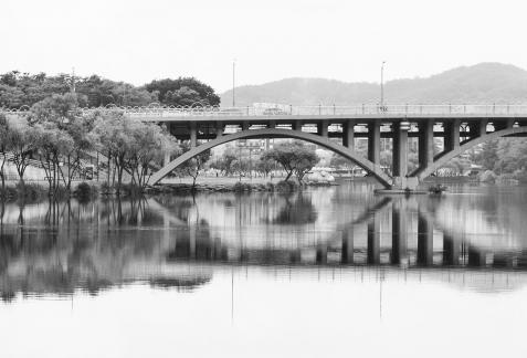 Reflection under the bridge