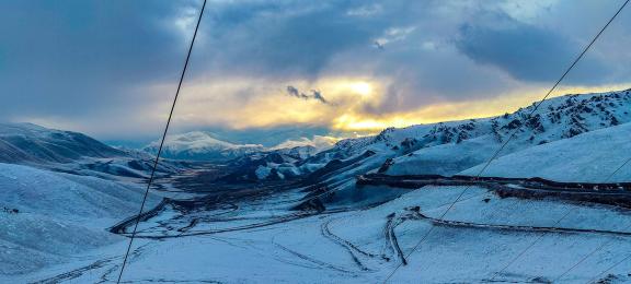 Crossing the snow capped mountains