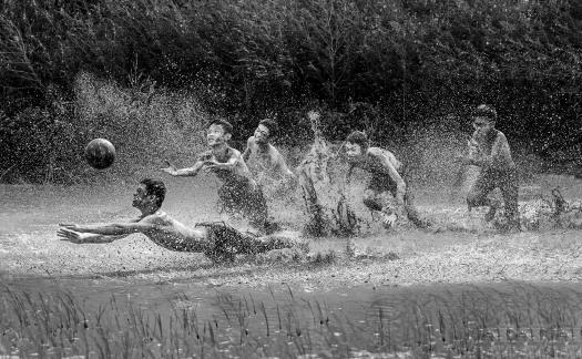 playing ball in mud