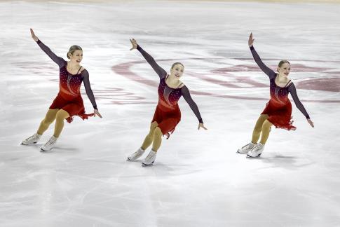 Three Red Skaters