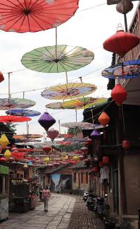 An oil paper umbrella in a lane 5