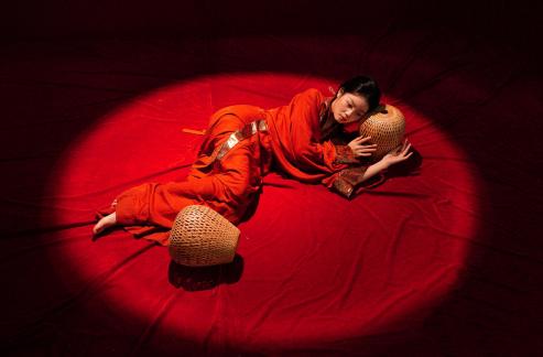 Bamboo lantern red clothed woman