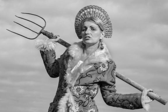 Girl with a pitchfork