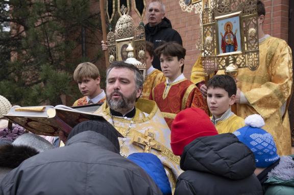 Priest and believers