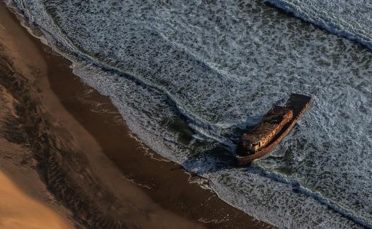 Sand Ocean and Wreck