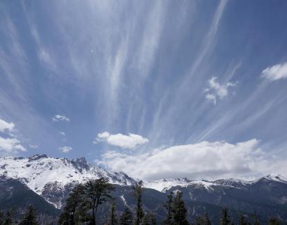 Snowy Peaks and Clear Clouds 16
