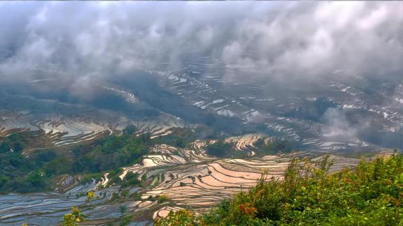 Clouds over terraced lands