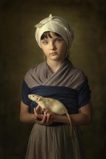 A girl with a rat