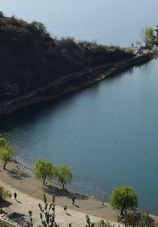 Mountains surround water 11