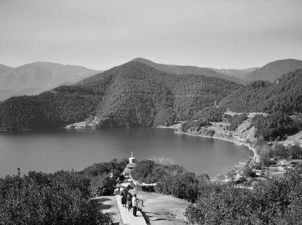 Mountains surround water 14