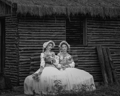 Under the wooden eaves