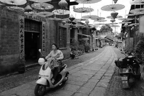 An oil paper umbrella in a lane 9